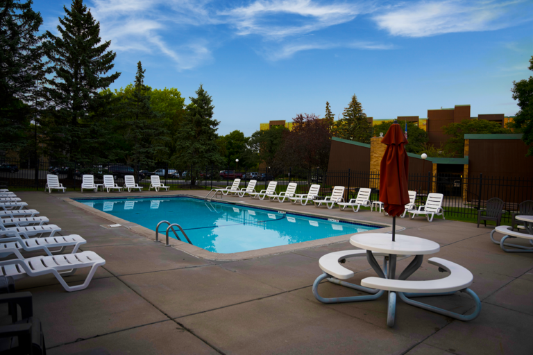 Enjoy summer days at the outdoor pool with sundeck